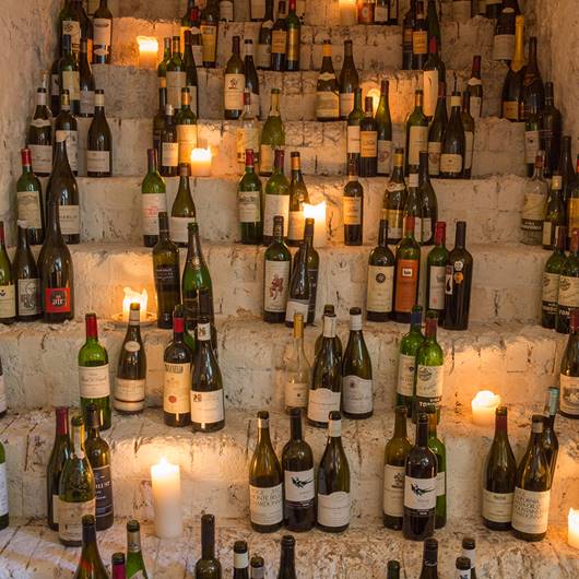 Wine bottles on cellar stairs.jpg